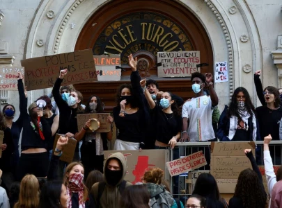 french lawmaker calls on interior minister to resign over police response to student protests