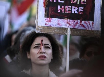 thousands march in france to back iranian protesters