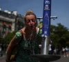 a woman cools off in a public fountain near the place du trocadero during high temperatures amid a heatwave in paris france on june 27 2026 photo reuters