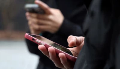 teenagers look at their mobile phone screens during an interview with reuters about the bill aimed at banning the use of social networks for those under 15 and mobile phones in high schools from the start of the 2026 school year in paris france february 20 2026 reuters