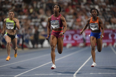 fraser pryce storms to 100m win fraser pryce storms to 100m win
