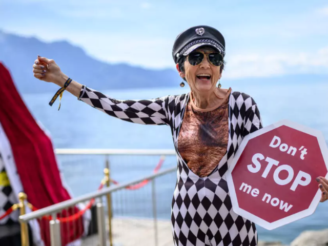 A fan dressed in an outfit resembling one of Freddie Mercury's late 1970s tour costumes. PHOTO: AFP