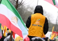 a supporter of the national council of resistance of iran waves an iran s flag as he takes part in a demonstration in support of the iranian people s uprising for democracy and freedom in brussels on january 9 2026 iran s supreme leader ayatollah ali khamenei on january 9 2026 insisted that the islamic republic would not back down in the face of protests after the biggest rallies yet in an almost two week movement sparked by anger over the rising cost of living photo afp
