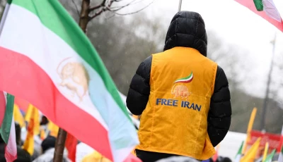 a supporter of the national council of resistance of iran waves an iran s flag as he takes part in a demonstration in support of the iranian people s uprising for democracy and freedom in brussels on january 9 2026 iran s supreme leader ayatollah ali khamenei on january 9 2026 insisted that the islamic republic would not back down in the face of protests after the biggest rallies yet in an almost two week movement sparked by anger over the rising cost of living photo afp