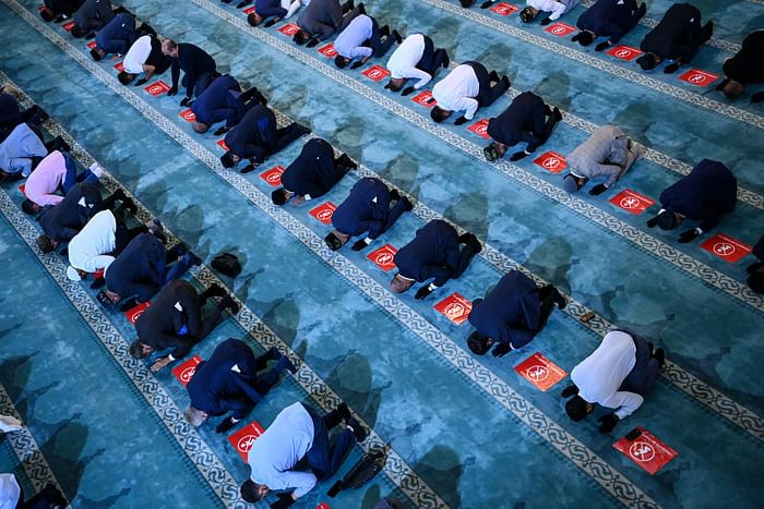 Russian Muslims gather in the Sobornaya mosque, Moscow Cathedral Mosque on July 20, 2021 during celebrations of Eidul Azha. PHOTO: AFP