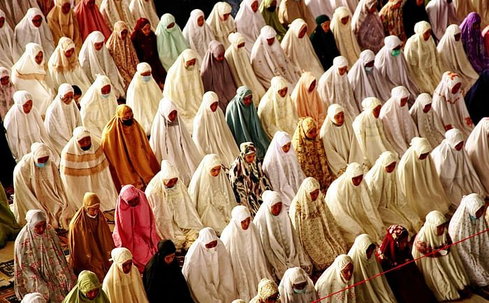 Muslims gather to pray at the Islamic Centre Mosque to mark Eidul Azha, the annual celebration known as the Festival of Sacrifice, in Lhokseumawe, Aceh on July 20, 2021. PHOTO: AFP