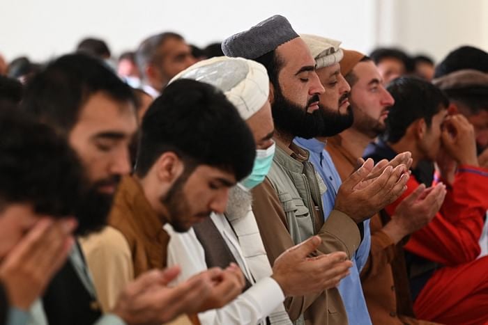 Afghan Muslim devotees offer their Eidul Azha prayers inside a mosque in Kabul on July 20, 2021. PHOTO: AFP