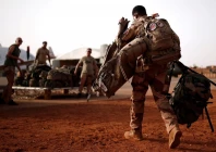 a french soldier leaves with his backpack at the operational desert platform camp pfod during the operation barkhane in gao mali august 1 2019 photo reuters