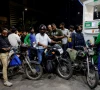 people wait to refuel their motorcycles at a petrol station following the rollout of a fuel relief scheme which provides a fuel subsidy for eligible motorcycles rickshaws and vehicles with engines of up to 800cc in karachi pakistan september 17 2026 reuters