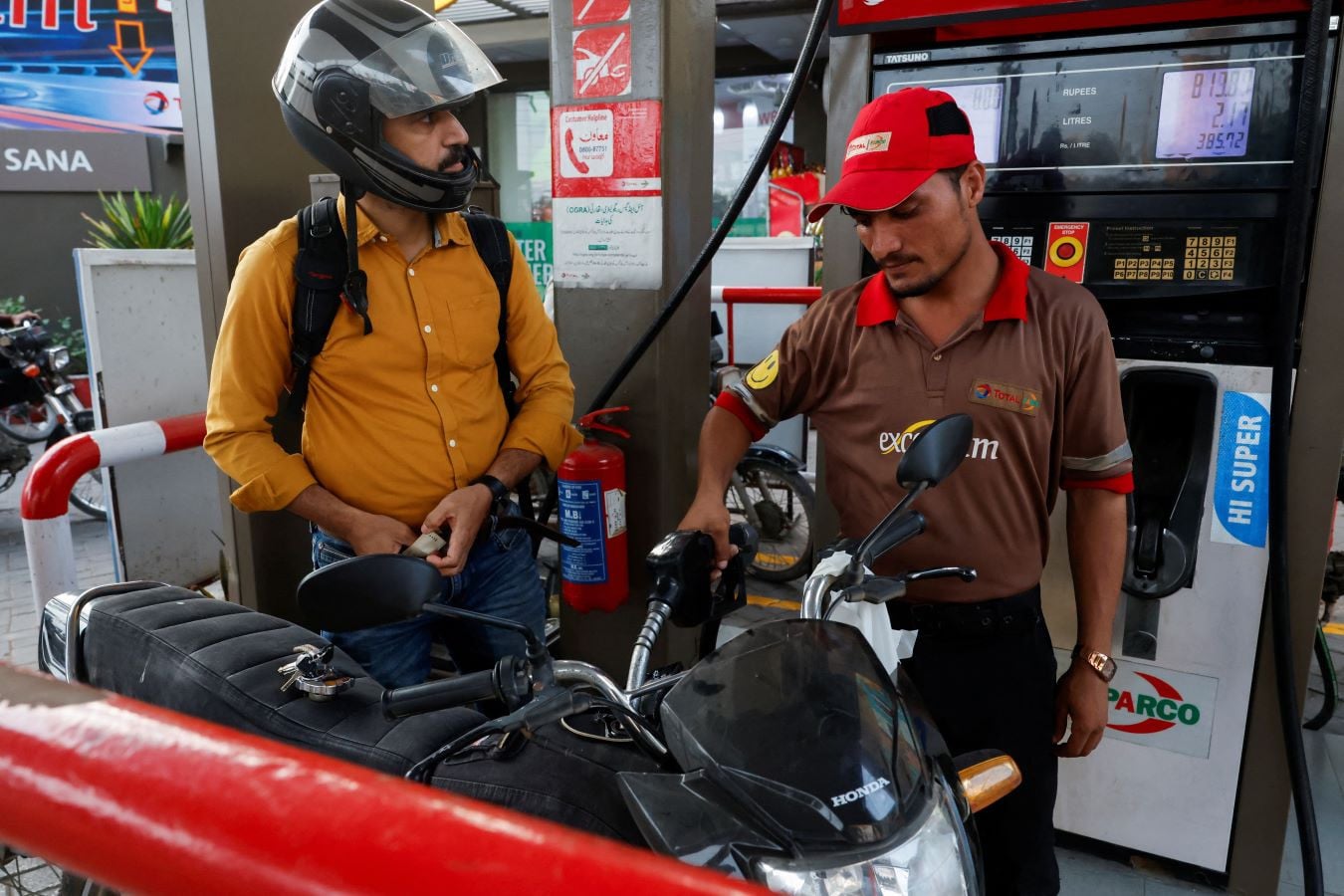 Amesh Gul, 32, a motorised auto-rickshaw driver, drives along a street amid rising fuel and liquefied petroleum gas (LPG) prices due to the Iran conflict, in Karachi, Pakistan, September 16, 2026. REUTERS