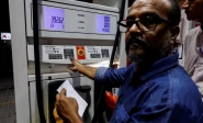 a worker updates the fuel price at a petrol station following the rollout of a fuel relief scheme which provides a fuel subsidy for eligible motorcycles rickshaws and vehicles with engines of up to 800cc in karachi pakistan september 16 2026 reuters file