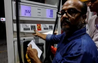 a worker updates the fuel price at a petrol station following the rollout of a fuel relief scheme which provides a fuel subsidy for eligible motorcycles rickshaws and vehicles with engines of up to 800cc in karachi pakistan september 16 2026 reuters
