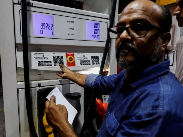 a worker updates the fuel price at a petrol station following the rollout of a fuel relief scheme which provides a fuel subsidy for eligible motorcycles rickshaws and vehicles with engines of up to 800cc in karachi pakistan september 16 2026 reuters a worker updates the fuel price at a petrol station following the rollout of a fuel relief scheme which provides a fuel subsidy for eligible motorcycles rickshaws and vehicles with engines of up to 800cc in karachi pakistan september 16 2026 reuters