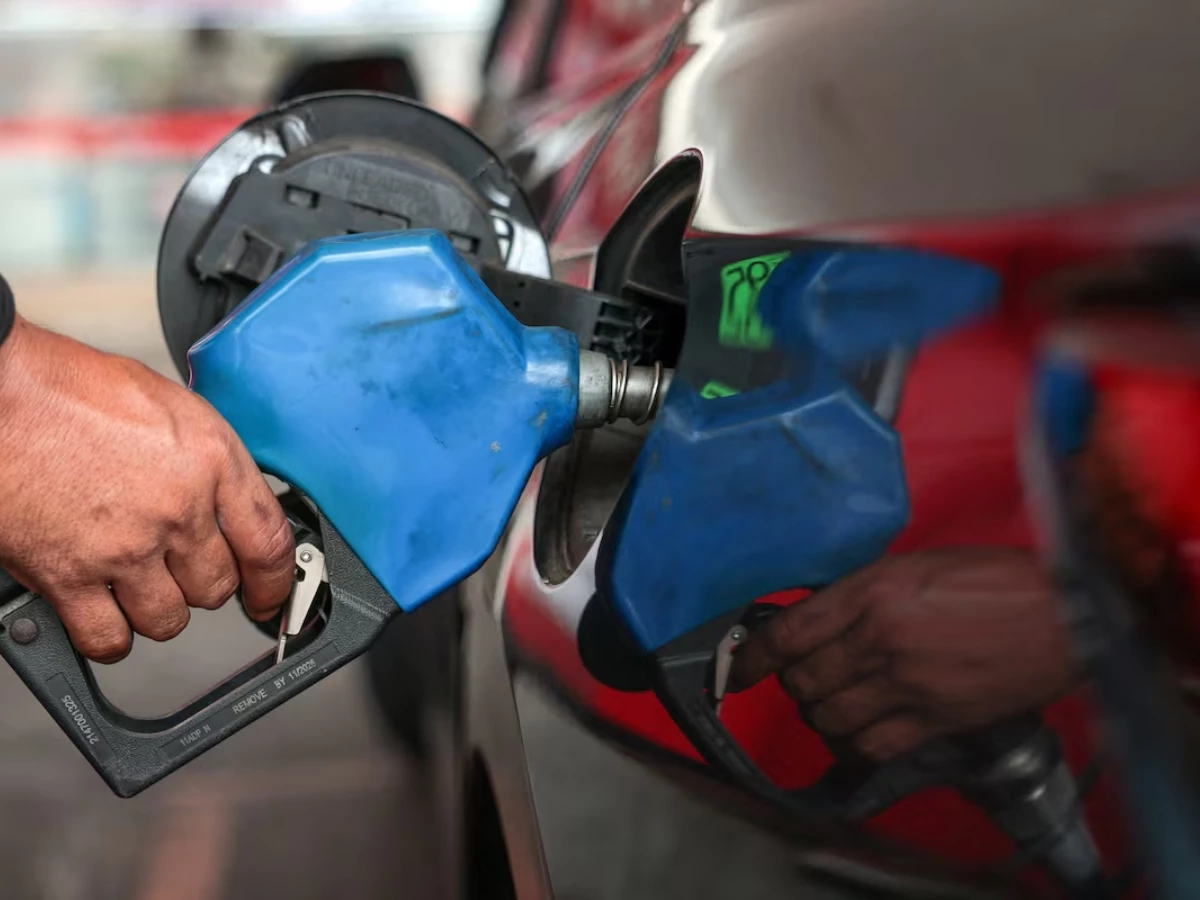 a worker fills a car s tank at a fuel station amid concerns about rising fuel prices linked to the us israel conflict with iran photo reuters file
