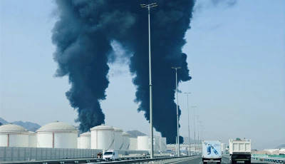 smoke rises in the fujairah oil industry zone caused by debris after interception of a drone by air defenses according to the fujairah media office amid the u s  israel conflict with iran in fujairah united arab emirates march 14 2026 photo reuters