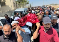 mourners carry the body of well known palestinian activist owdeh hathaleen who according to people who said they witnessed the shooting was shot and killed in the village of umm al khair by israeli settler last week during his funeral near the city of hebron in the israeli occupied west bank august 7 2025 photo reuters
