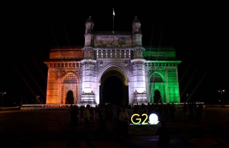 the gateway of india monument is lit up as part of india s g20 presidency event in mumbai on december 13 2022 photo reuters