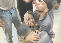 palestinians who were injured in israeli strikes on displacement tents in khan yunis react after they arrive at the nasser hospital in the southern gaza strip photo afp