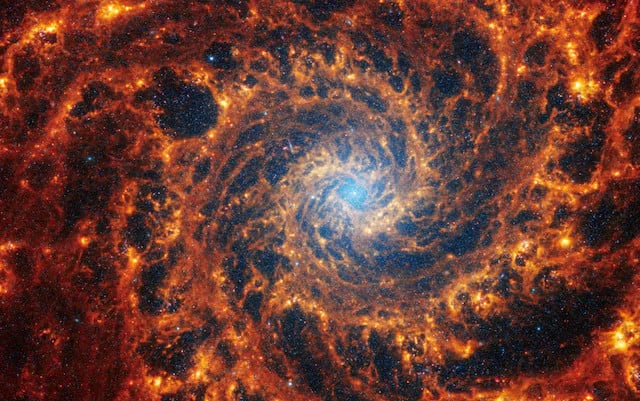 spiral galaxy ngc 628 located 32 million light years away from earth is seen in an undated image from the james webb space telescope nasa esa csa stsci janice lee stsci thomas williams oxford and the phangs team handout via reuters