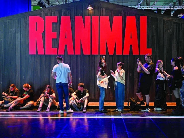 gamers wait at the reanimal video game of the tarsier studios during the gamescom in cologne photo afp gamers wait at the reanimal video game of the tarsier studios during the gamescom in cologne photo afp