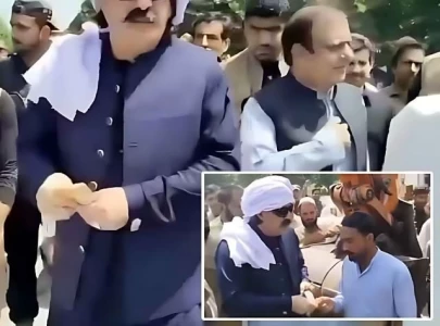 pti s gandapur caught on video distributing cash before islamabad rally postponement pti s gandapur caught on video distributing cash before islamabad rally postponement