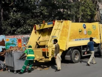 workers of lahore waste management company busy in removing the garbage as punjab government launched modern and organized system of cleanliness in the provincial capital city with the collaboration of turk companies photo app