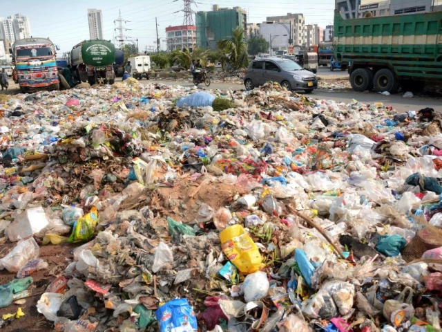 heap of garbage lying on the service road of korangi road shows the negligence of concerned authorities photo express heap of garbage lying on the service road of korangi road shows the negligence of concerned authorities photo express