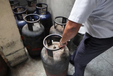 an employee checks empty lpg cylinders inside vidyarthi bhavan restaurant as restaurants and hotels in southern india including the it hub of bengaluru have warned of shutdowns amid disruptions in commercial lpg supply following the u s  israeli conflict with iran in bengaluru india march 10 2026 photo reuters