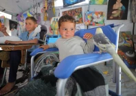 palestinian children play with animals at the rehabilitation space in the nuseirat refugee camp photo afp