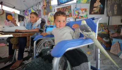 palestinian children play with animals at the rehabilitation space in the nuseirat refugee camp photo afp