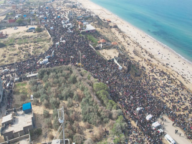 a drone view shows displaced palestinians waiting for israeli permission to return to their homes in northern gaza in the central gaza strip photo reuters