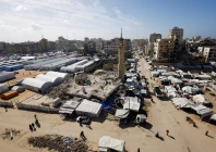 a mosque destroyed during the two year israeli offensives is surrounded by tents for displaced palestinians in gaza city february 11 2026 photo reuters
