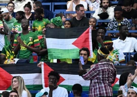 football fans protest israel with palestinian flags at olympics