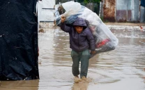 un agency warns displaced gazans face floods as emergency supplies blocked