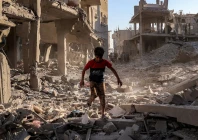 a boy walks through the rubble of a building that was destroyed following israeli bombardment at the maghazi refugee camp in the central gaza strip on 12 june 2026 photo afp