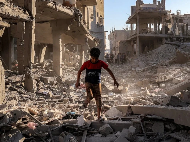 a boy walks through the rubble of a building that was destroyed following israeli bombardment at the maghazi refugee camp in the central gaza strip on 12 june 2026 photo afp a boy walks through the rubble of a building that was destroyed following israeli bombardment at the maghazi refugee camp in the central gaza strip on 12 june 2026 photo afp
