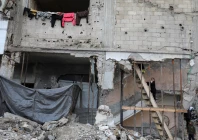 a palestinian girl climbs a wooden ladder at a residential building damaged during the war in gaza city december 14 2025 photo reuters a palestinian girl climbs a wooden ladder at a residential building damaged during the war in gaza city december 14 2025 photo reuters
