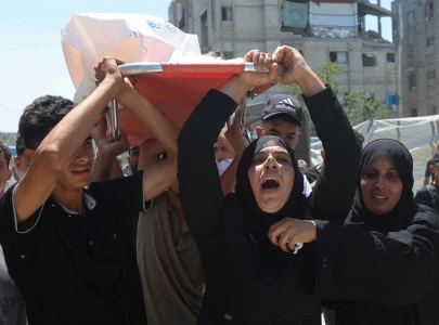 israeli fire kills nine in gaza including 10 year old boy officials say israeli fire kills nine in gaza including 10 year old boy officials say