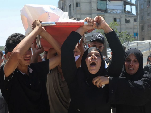 mother of palestinian child muataz abu shaar who was killed by israeli fire according to medics and other mourners carry his body during his funeral in khan younis in the southern gaza strip july 14 2026 photo reuters mother of palestinian child muataz abu shaar who was killed by israeli fire according to medics and other mourners carry his body during his funeral in khan younis in the southern gaza strip july 14 2026 photo reuters