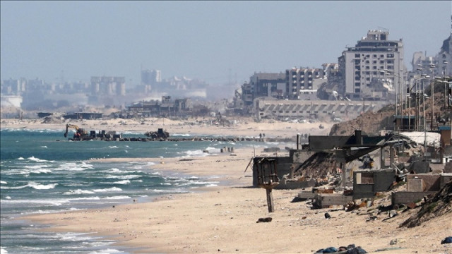 small boats began unloading the ship s cargo on friday and transporting it towards the shore of gaza city photo anadolu agency small boats began unloading the ship s cargo on friday and transporting it towards the shore of gaza city photo anadolu agency
