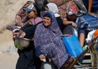 displaced palestinians fleeing northern gaza due to an israeli military operation ride a vehicle pulled by an animal as they move southwards following israeli forces orders to leave gaza city in the central gaza strip october 3 2025 photo reuters