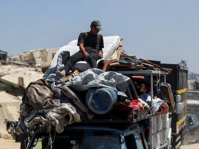 displaced palestinians fleeing northern gaza travel in a vehicle while they head south as the israeli military prepares to relocate residents to the southern part of the enclave in gaza city august 18 2025 photo reuters