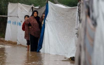 woman killed family members injured as storms cause building collapse in gaza