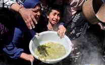 un chief warns gaza crisis still dire despite famine being averted