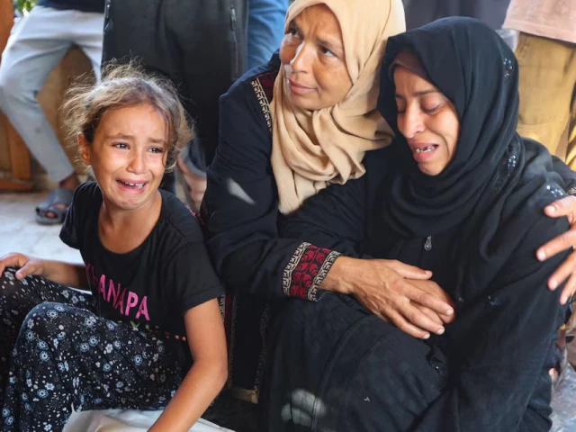 mourners react at the funeral of palestinians killed in an israeli strike on saturday according to medics at nasser hospital in khan younis southern gaza strip october 5 2025 photo reuters