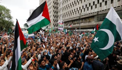 people carry flags as they chant slogans to express solidarity with palestinian people and to protest against israel during a rally in karachi pakistan may 21 2021 photo reuters