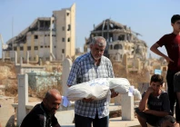 a relative carries the body of palestinian girl ameera al masri who was killed along with her parents and all three of her siblings in an israeli strike on their apartment in gaza city july 21 2026 reuters