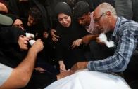 mourners react during the funeral of three palestinians including 10 year old tareq sabah who were killed in an israeli strike according to medics at nasser hospital in khan younis in the southern gaza strip july 1 2026 reuters mourners react during the funeral of three palestinians including 10 year old tareq sabah who were killed in an israeli strike according to medics at nasser hospital in khan younis in the southern gaza strip july 1 2026 reuters
