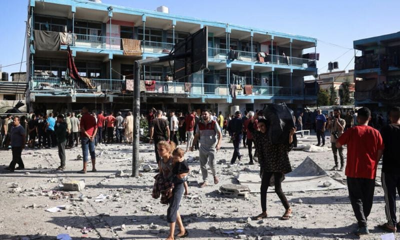 an israeli air strike wednesday hit a central gaza school killing 14 people photo reuters