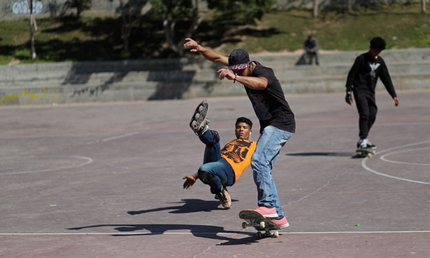 Members of Gaza Skating Team, Mohammad Al-Sawalhe, 23, and Mustafa Sarhan, 19, practice their rollerblading and skating skills in Gaza City March 10, 2019. PHOTO: REUTERS